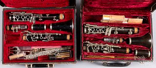 Two cased clarinets, by Bundy and M. Dupont.