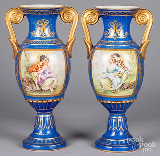 Pair of Sevres style porcelain urns