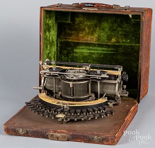 Hammond No.12 typewriter, with tin case