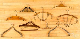 Collection of antique clothes hangers.