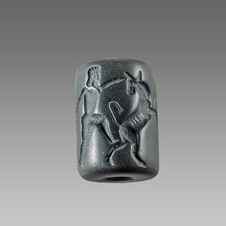 Near Eastern Style Cylinder Seal with figures and animals.