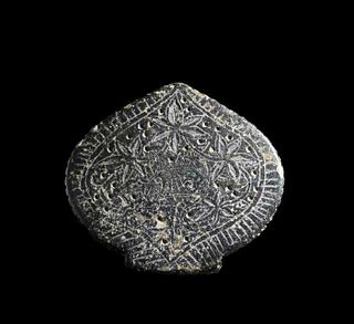 A hard stone pendent ( TAKTHI) caved in floral design , 16th century Timurid Period. 