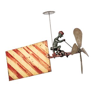 A Cast Iron and Sheet Copper Cycling Automaton Whirligig 