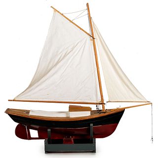 A Carved and Painted Wood Ship Model