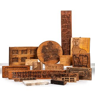 Sixteen Carved Wood Butter Molds