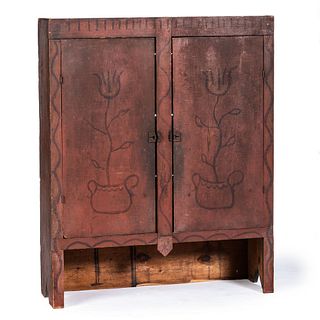 A Country Snake and Tulip Decorated Red-Washed Pine Two-Door Jelly Cupboard