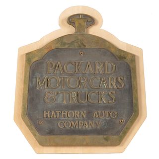 A Brass Packard Motor Cars and Trucks Plaque