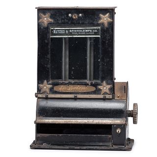 A Star-Decorated Three-Column Penny Match Dispenser
