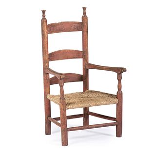 A William and Mary Style Red-Painted Pine and Maple Child's Rush Seat Armchair