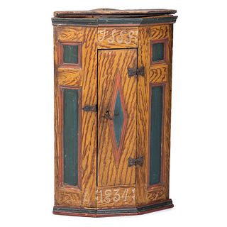 A Scandinavian Carved and Paint Decorated Corner Cabinet