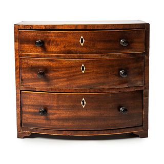 A Miniature Bow Front Chest of Drawers in Mahogany with Satinwood Inlay