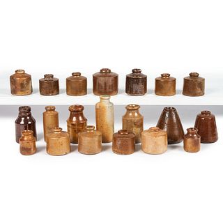 Twenty Diminutive Stoneware Inkwells and Bottles