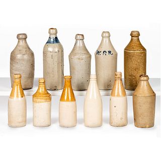 Eleven Stoneware Bottles