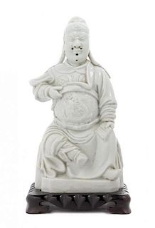 A Chinese Blanc-de-Chine Porcelain Figure 18TH/19TH CENTURY Height overall 11 inches.