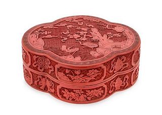 A Chinese Cinnabar Lacquer Box and Cover EARLY 20TH CENTURY Height 5 x width 14 3/8 inches.