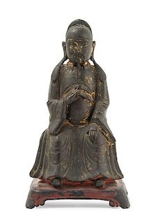 A Chinese Parcel Gilt Bronze Figure of a Scholar MING DYNASTY Height 9 1/2 inches.