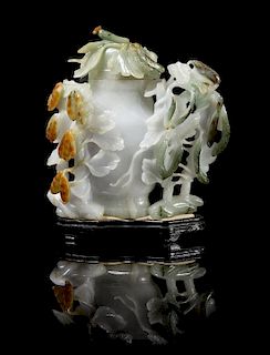 A Chinese Jadeite Covered Vase Overall height 6 1/2 x width 6 inches.