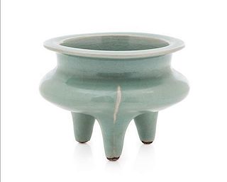 A Chinese Longquan Celadon Glazed Porcelain Tripod Censer SONG DYNASTY OR LATER Height 3 1/4 inches.