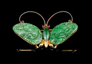 A Jadeite and 14 Karat Gold Butterfly Brooch 19TH/20TH CENTURY Width 2 1/4 inches.