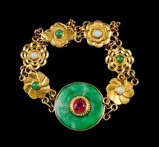 A Jadeite, 22 Karat Gold, Opal and Red Stone Bracelet Diameter 2 1/2 inches.