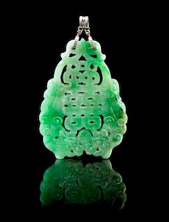 A Chinese Pierce Carved Jadeite, Platinum and Diamond Plaque Height 2 1/2 inches.