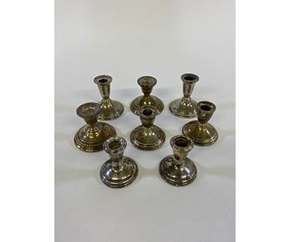 Four Pair Weighted Sterling Silver Candlesticks