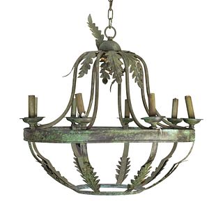 A Pair of Italian Baroque Style Grey-Patinated Iron Eight-Light Chandeliers
Height 28 x diameter 30 inches.