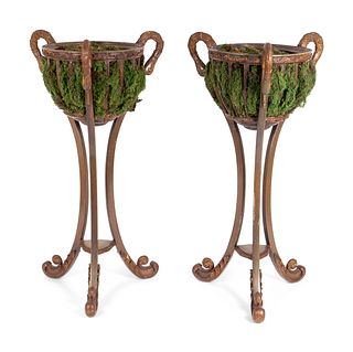 A Pair of Neoclassical Style Composition Jardinieres
Height 48 x diameter of bowl 18 inches.