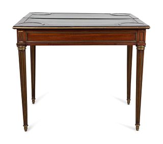 A Russian Neoclassical Style Brass-Mounted Mahogany Games Table
Height 29 x width 33 3/4 x depth 16 3/4 inches.  Top extended 33 5/8 inches square. 