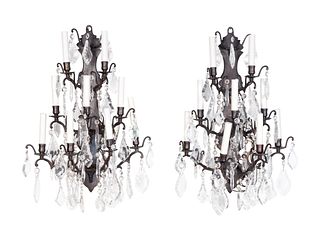 A Pair of Louis XV Style Wrought-Iron and Glass Appliques
Height 25 x width 18 x depth 9 1/2 inches.