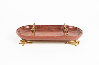 A Barbedienne Gilt-Bronze and Rouge Marble Pen Rest
Height 2 1/4 x width 11 3/4 inches.