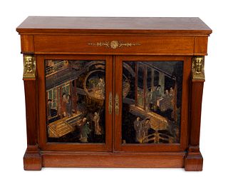 An Empire Style Gilt-Bronze-Mounted Coromandel Lacquer and Mahogany Mueble d'Appui
Height 37 x length 43 1/4 x depth 19 inches.