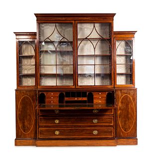A George III Style Inlaid Mahogany Breakfront Secretary Bookcase
Height 85 x length 88 1/4 x depth 19 inches.