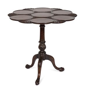 A George III Mahogany Tilt-Top Supper Table
Height 30 1/2 x diameter 32 inches.