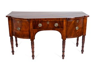 A George IV Figured Mahogany Sideboard
Height 37 x length 68 1/2 x depth 27 1/2 inches.