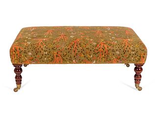 A Victorian Upholstered Ottoman
Height 15 x length 40 x width 25 inches.