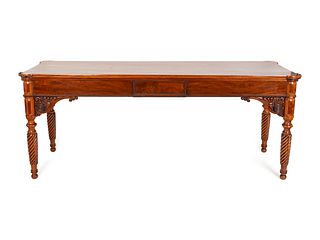 An Edwardian Carved MahoganyNinepins Table
Height 36 x length 88 x depth 28 inches.