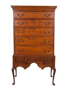 A Queen Anne Cherrywood Flat-Top Highboy
Height 70 1/4 x width 39 1/4 x depth 20 1/2 inches.