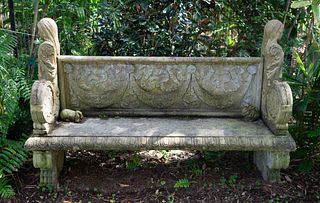A Neoclassical Cast Stone Garden Bench
Height 45 x width 72 1/4 x 21 inches.