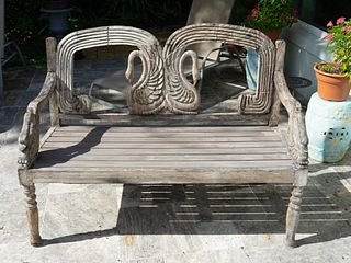 A Pair of Swedish Weathered Teak Garden Benches
Height 38 1/2 x width 51 3/4 x depth 22 inches.