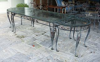 A Salterini Wrought Iron Glass Top Dining Table for Twelve
Height 29 3/4 x length 124 1/2 x depth 40 1/4 inches.