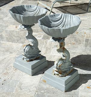 A Pair of Neoclassical Painted Iron Jardinieres
Height 26 x diameter 15 1/2 inches.