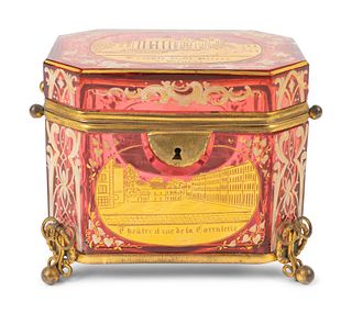 A Swiss Gilt-Decorated and Enameled Red-Flashed Glass Box
Height 4 3/8 x length 5 x depth 3 1/2 inches.