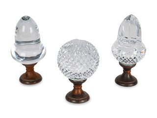 Three Molded Glass and BronzeBoules d'Escalier
Heights 6, 7 1/4 and 7 1/2 inches.