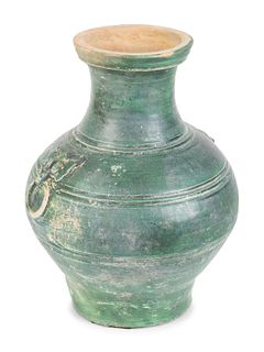 A Chinese Green-Glazed Hu-Form Vase
Height 13 1/2 inches.
