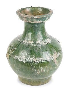 A Chinese Green-Glazed Terracotta Hu-Form Vase
Height 14 inches.