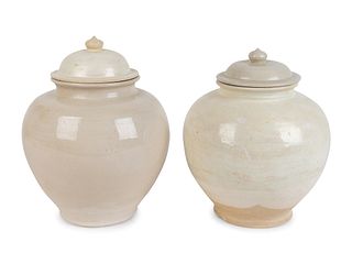 Two Chinese Porcelain Lidded Jars
Height 11 x diameter 8 inches.