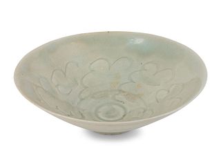 A Qingbai Incised Porcelain Bowl
Height 2 1/4 x diameter 7 inches.