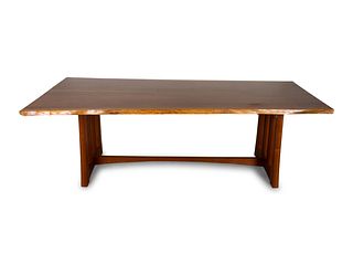 A Robert Ortiz Live-Edge Cherrywood Dining Table
Height 29 x length 89 1/2 x width 48 inches.