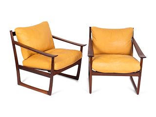 Peter Hvidt and Orla Molgaard Nielsen 
(Danish, 1916-1986) and  (Danish, 1907-1993)
A Pair of Rosewood Lounge Chairs